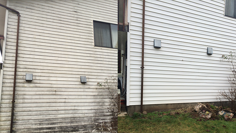 Before and after vinyl siding cleaning.